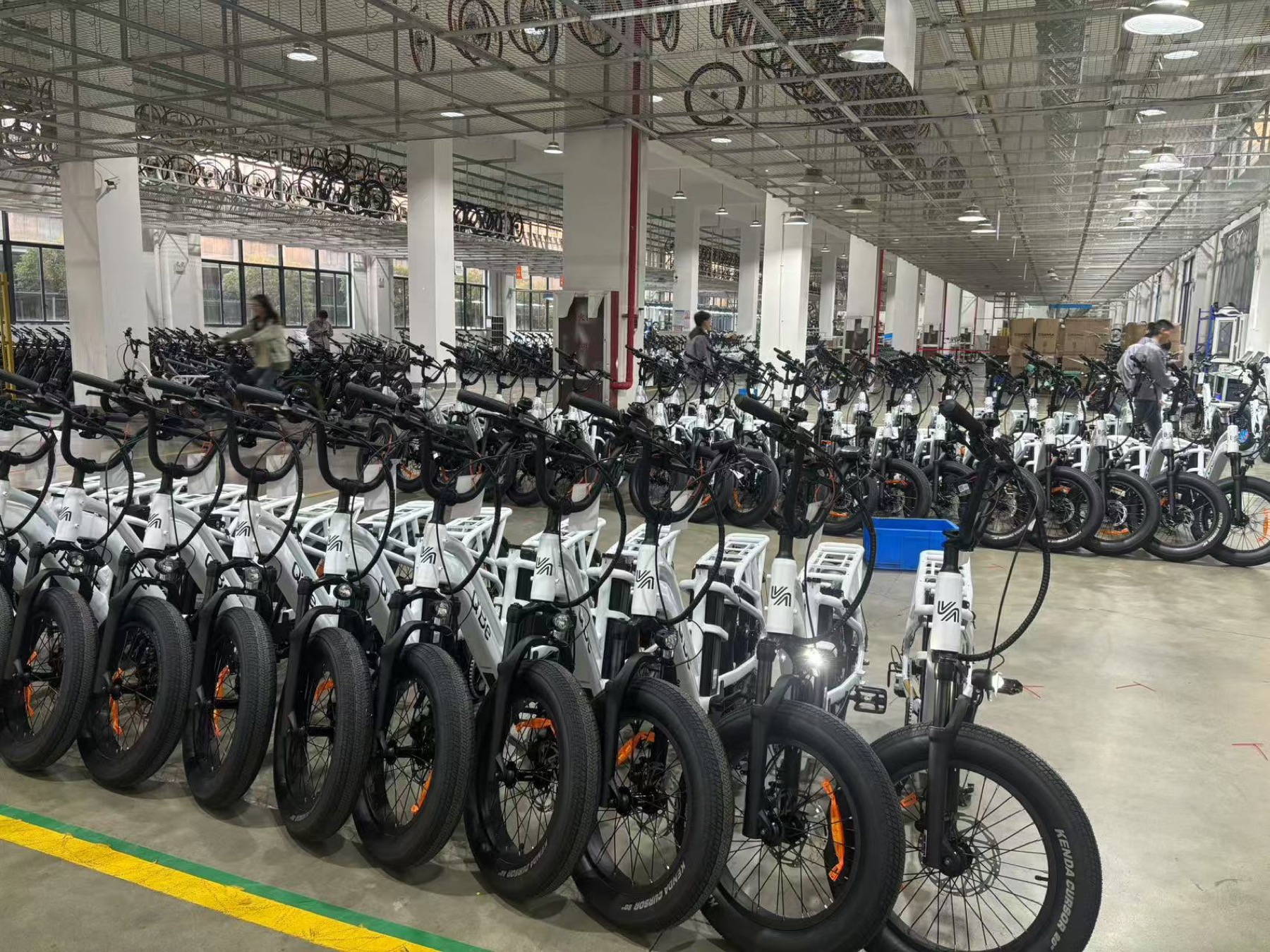 VelyVelo electric delivery bikes on a manufacturing line